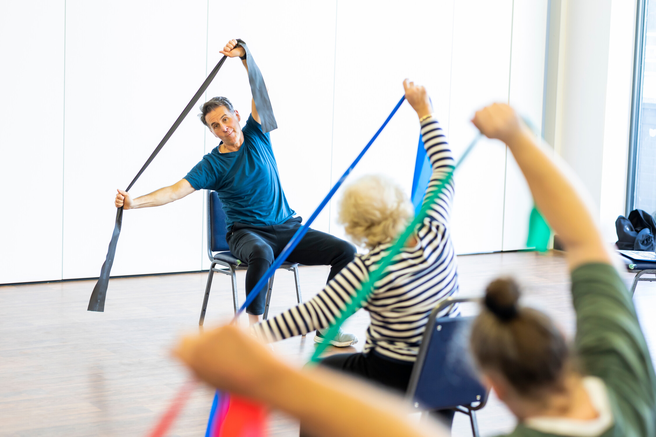 3 people taking part in exercise.